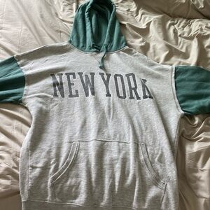 green and grey hoodie